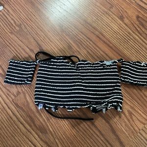 bathing suit top. ties up in the back and can also be worn as a top with shorts